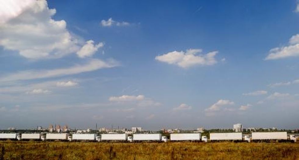 Russian Aid Convoy Stops Before Border With Ukraine