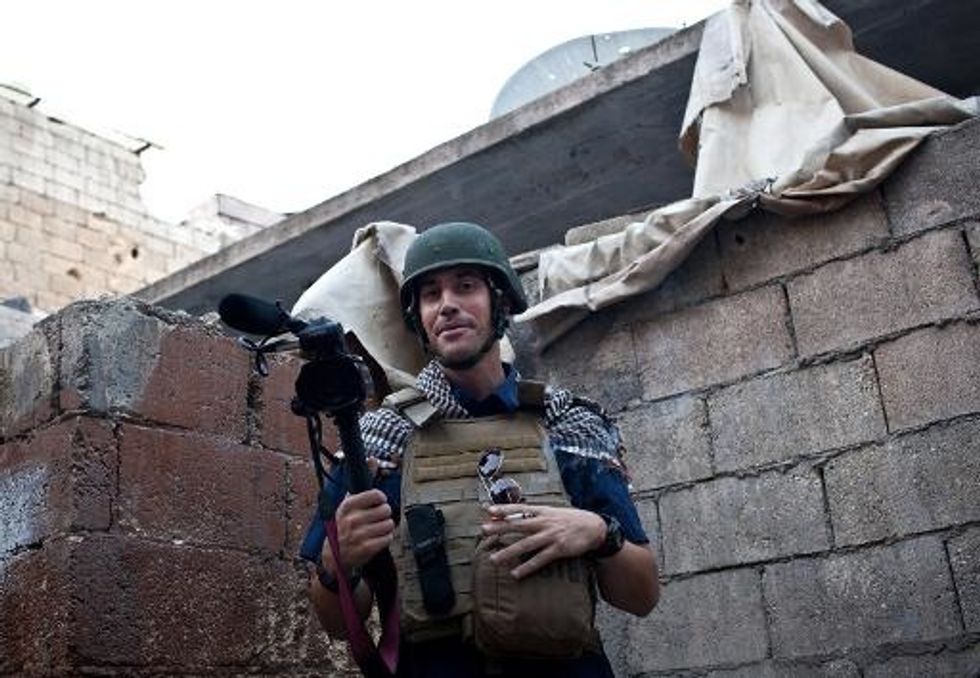 IS Claims Beheading Of Journalist, Warns U.S. On Iraq Strikes