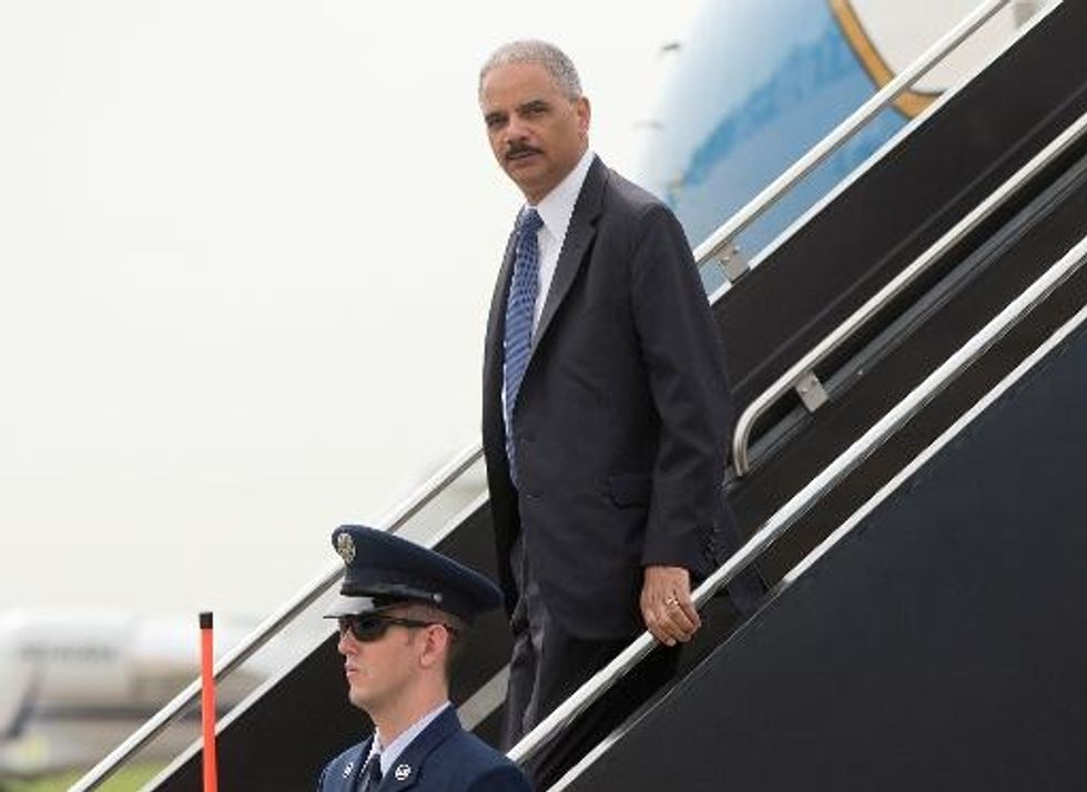 Uneasy Calm In Ferguson As Holder To Meet With Leaders