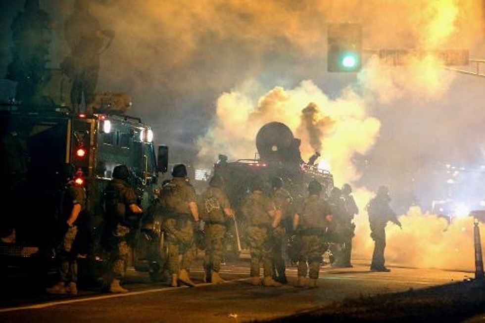 Tense Tally In Ferguson Includes Fires, Shootings, And 31 Arrests