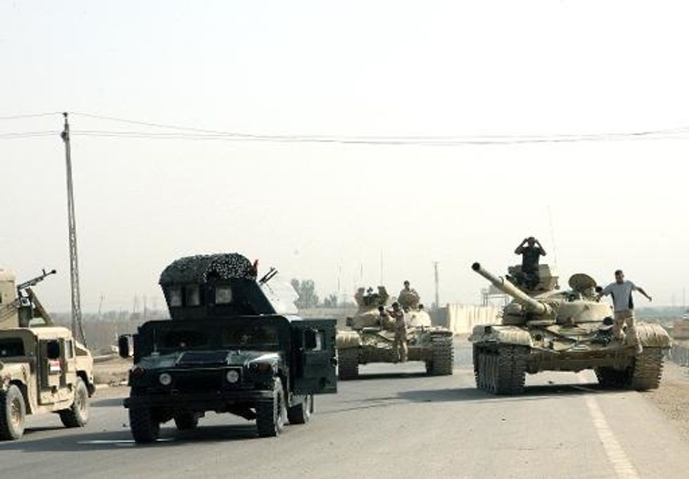 Iraqi Forces Battle Islamic State Militants In Tikrit