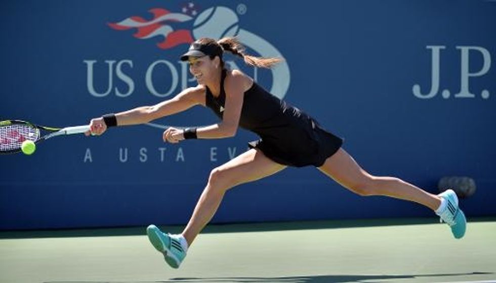 Ivanovic Stunned At U.S. Open, Azarenka Battles Back