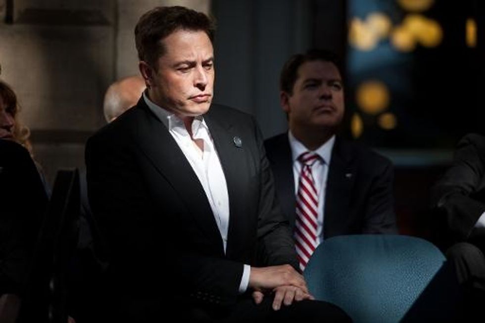 Tesla Chief Says Self-driving Cars Just Around Corner