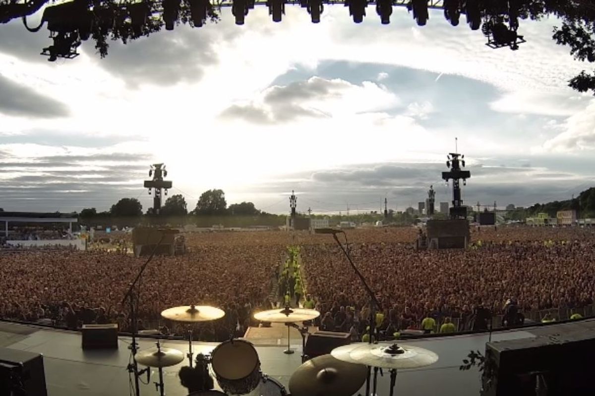 a full stadium seen from the stage.