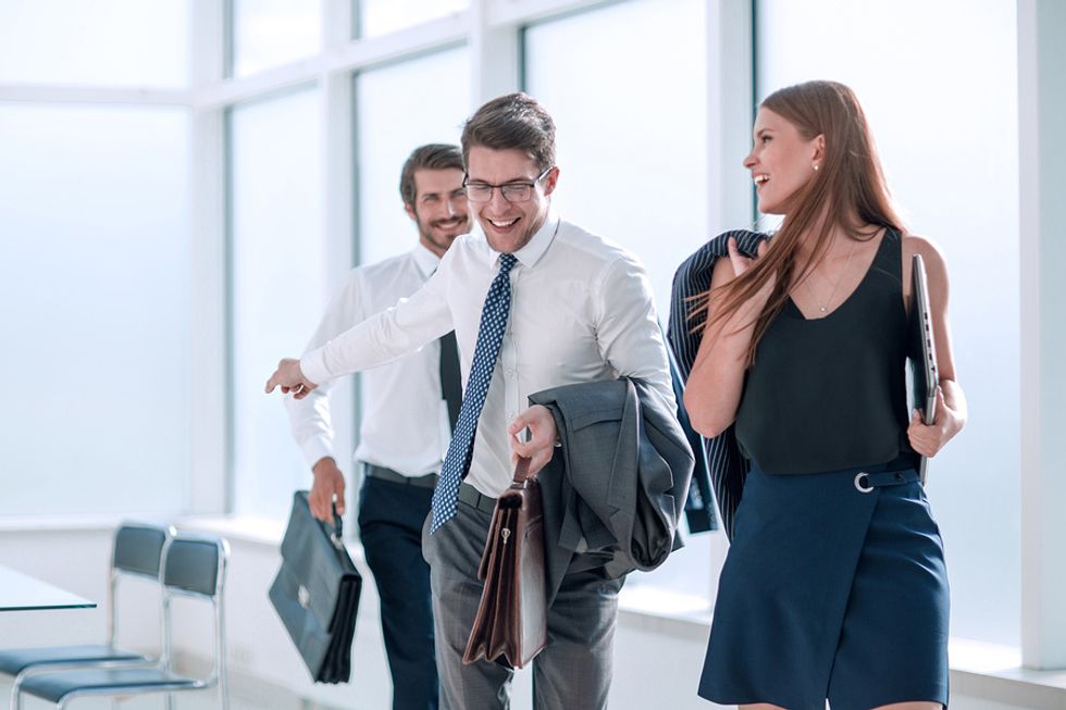 Co-workers leave the office happy on Employee Appreciation Day