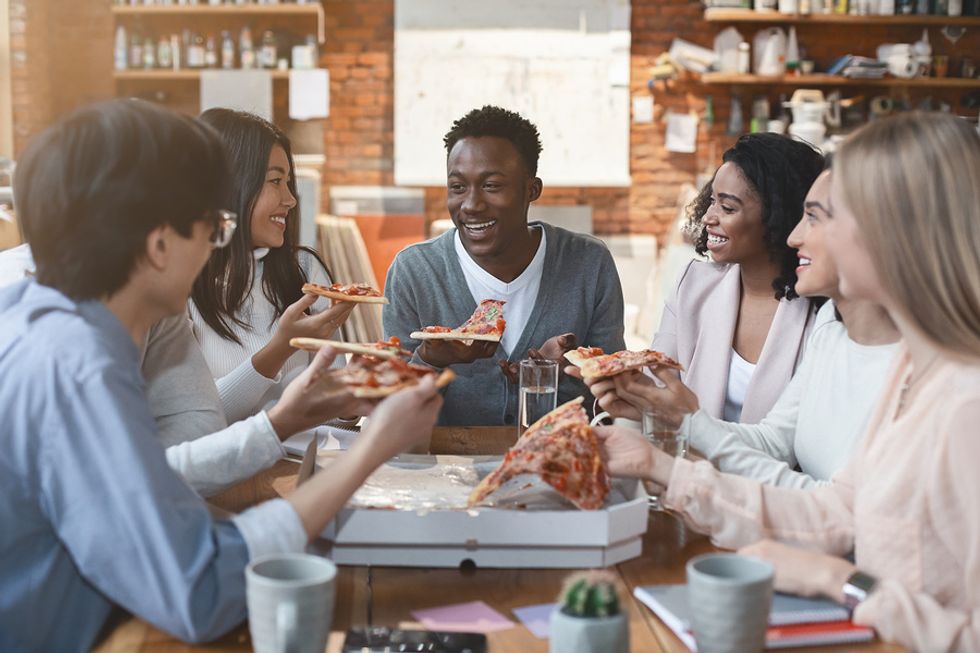 Manager orders pizza for his employees on Employee Appreciation Day