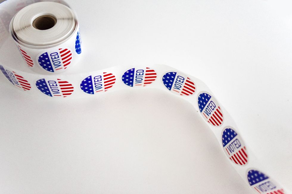 https://www.pexels.com/photo/i-voted-sticker-spool-on-white-surface-1550336/