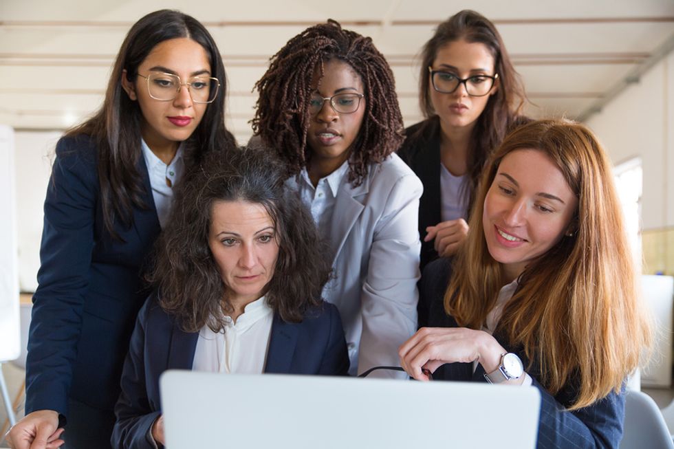 Group of women work together to achieve success