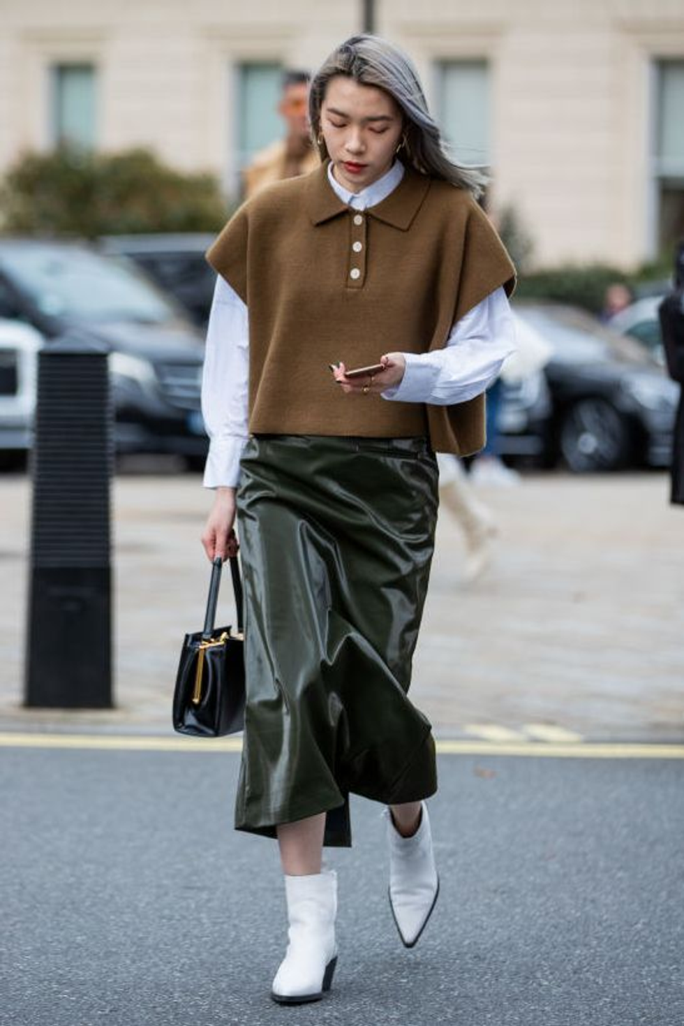 layer button up pieces with midi skirts and ankle boots