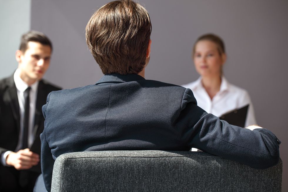 Man has bad body language during a job interview