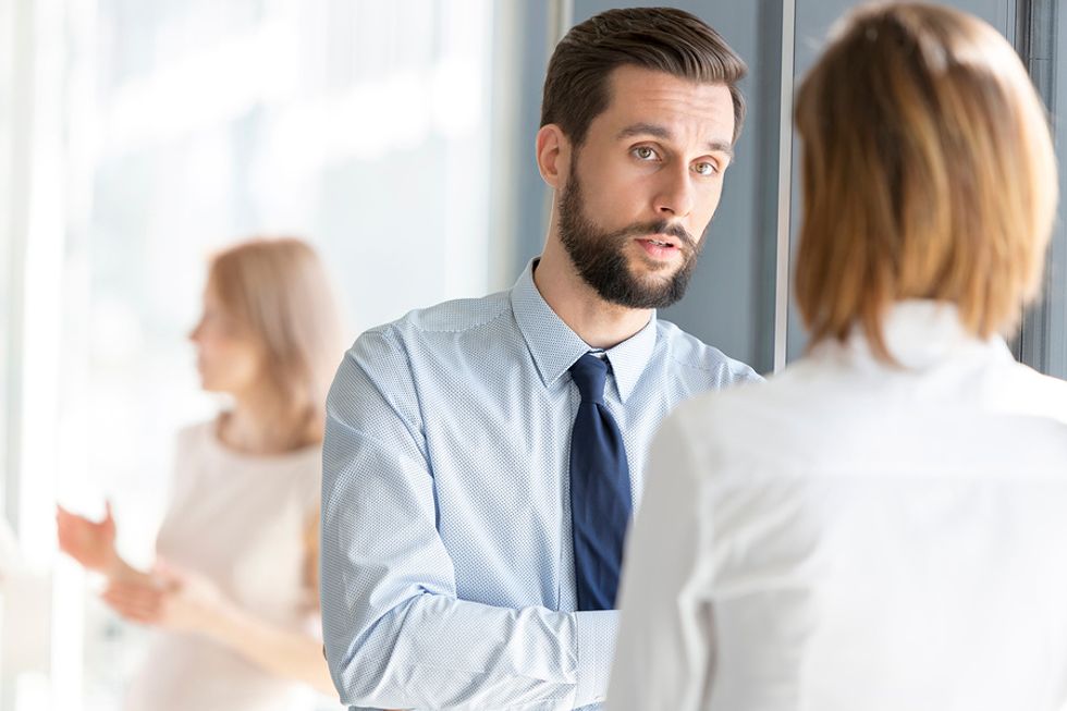 Man practices active listening in the workplace