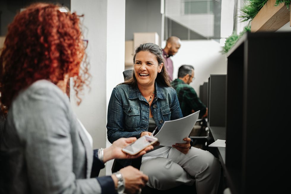 Two women in the workplace with good communication skills