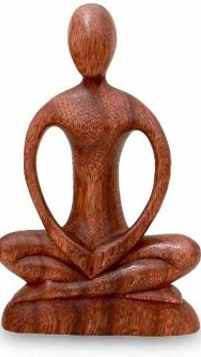 wooden medatative statue