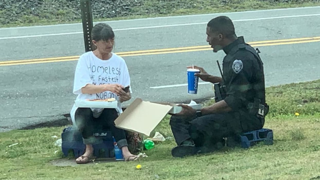 This North Carolina police officer spent his lunch sharing pizza with a homeless woman