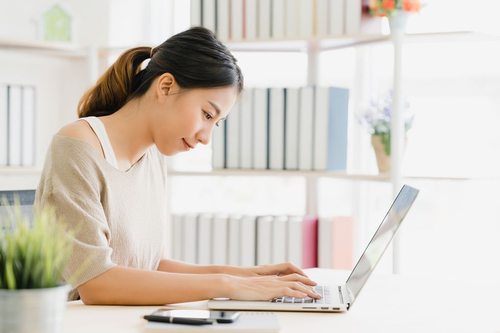 Professional woman is productive while working from home during the coronavirus