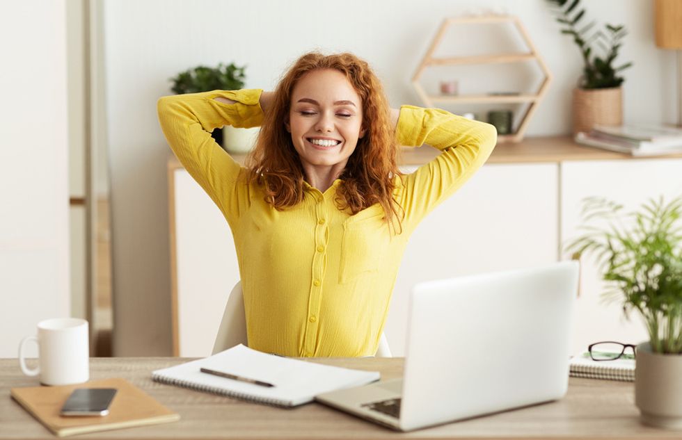 Woman focuses on her health while she works from home during the coronavirus