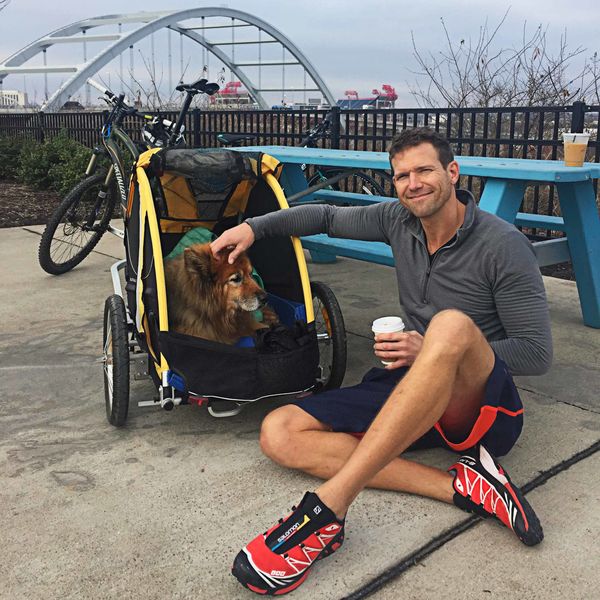 Dr. Travis Stork with a bicycle.