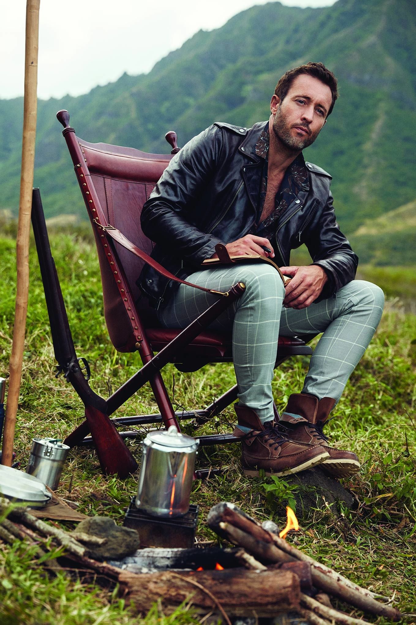 Alex O\u2019Loughlin wearing plaid pants and boots