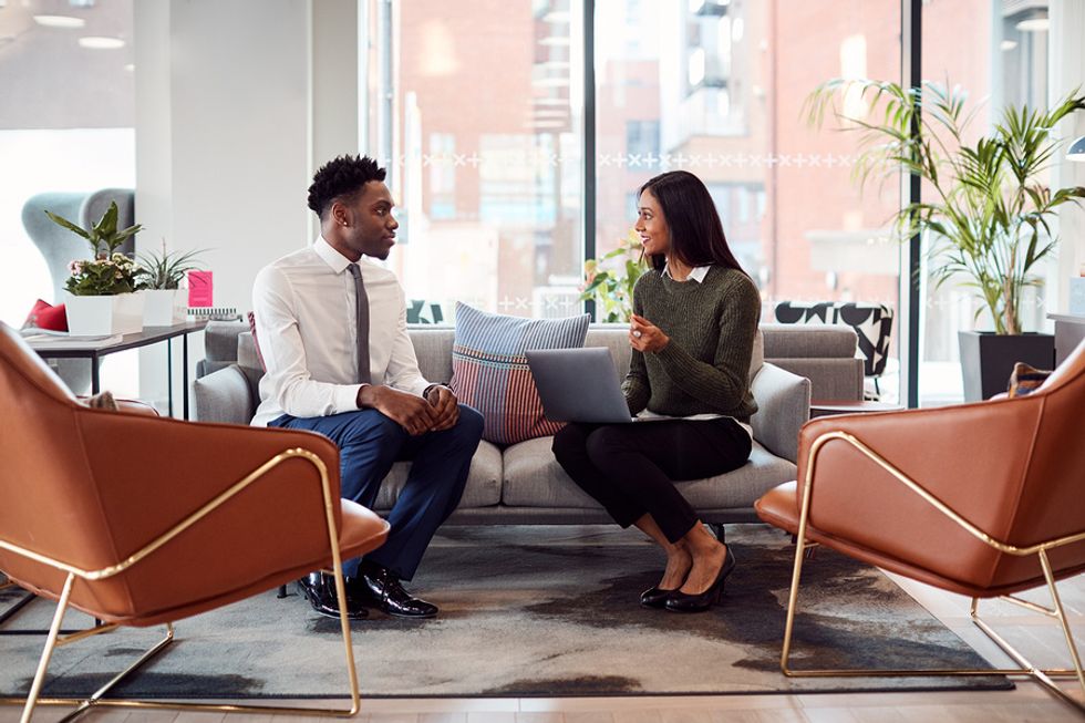 Man attends his exit interview after quitting his job