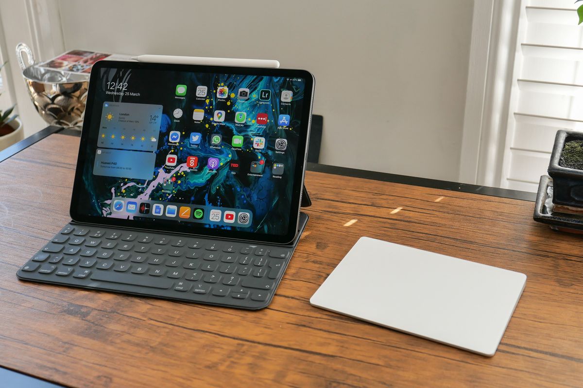 iPad with a keyboard, stylus and trackpad