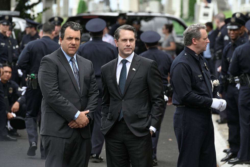 Thomas Sadoski in a suit.