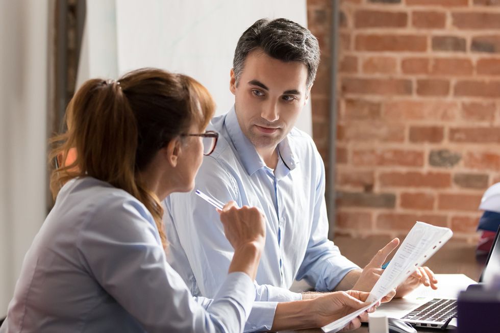 Man talks to his manager about her expectations