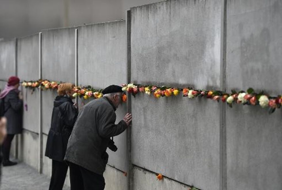 Raucous Party Follows Somber Recollections At Berlin Wall