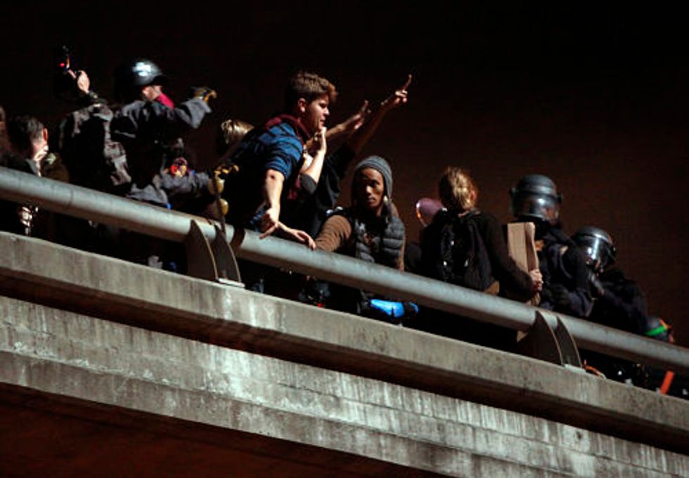 150 Arrested As Berkeley Protesters Halt Freeway Traffic, Stop Amtrak Train