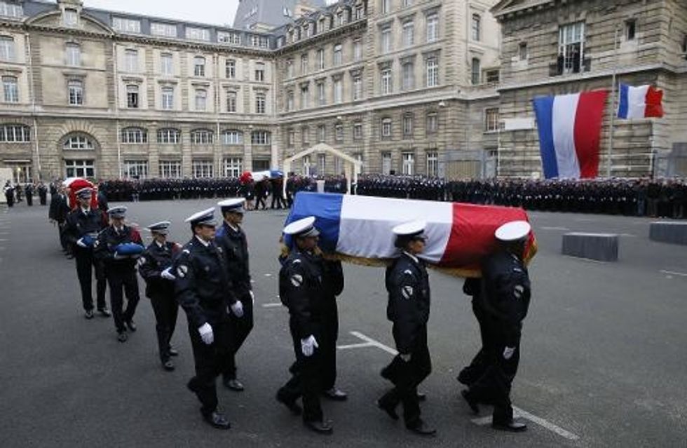 Hollande Vows France ‘Will Never Yield’ As Attack Victims Buried