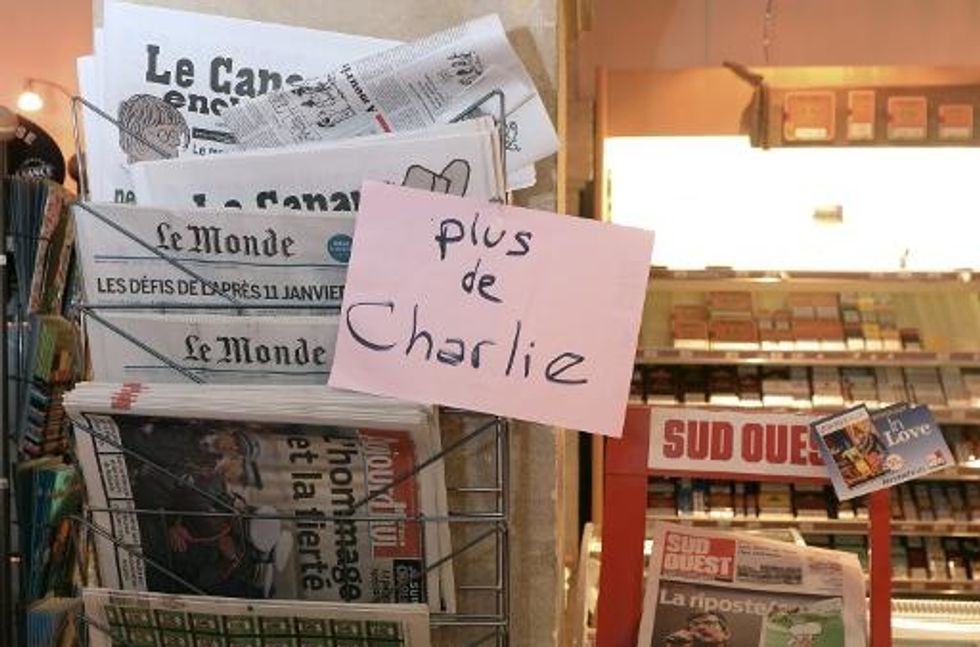 New Charlie Hebdo Flies Off Shelves As Qaeda Claims Attack
