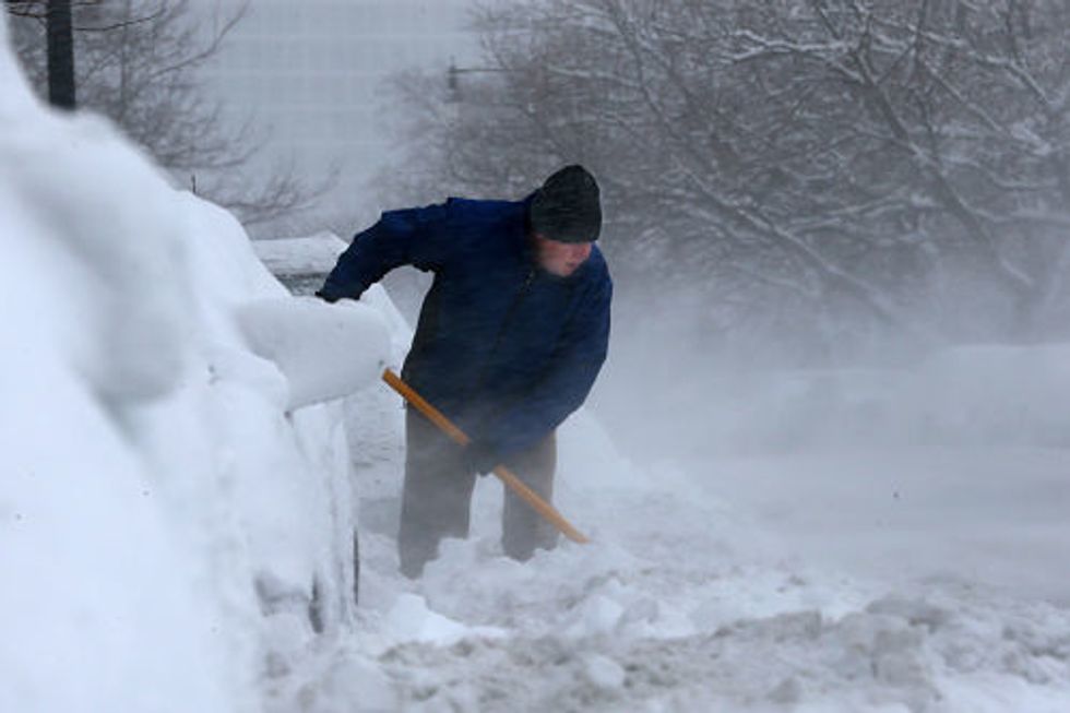Another Snowstorm Wallops Northeast; Thousands Of Flights Canceled