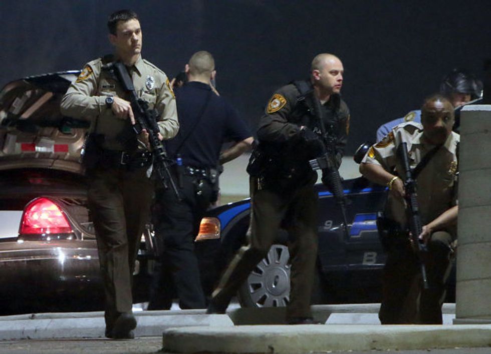 Vigil Draws Dozens To Scene Near Where Officers Were Shot In Ferguson