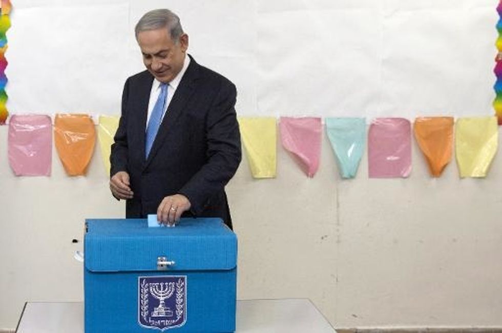Israel Exit Polls Show Virtual Tie Between Netanyahu And Herzog