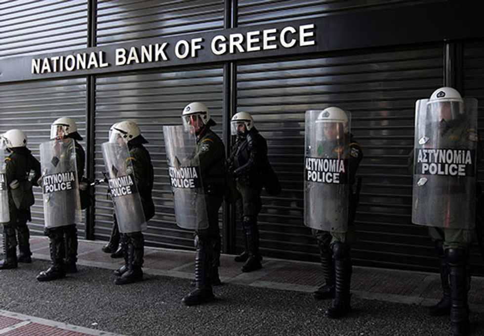Greece’s 2014 Deficit More Than Double Forecasts: Official