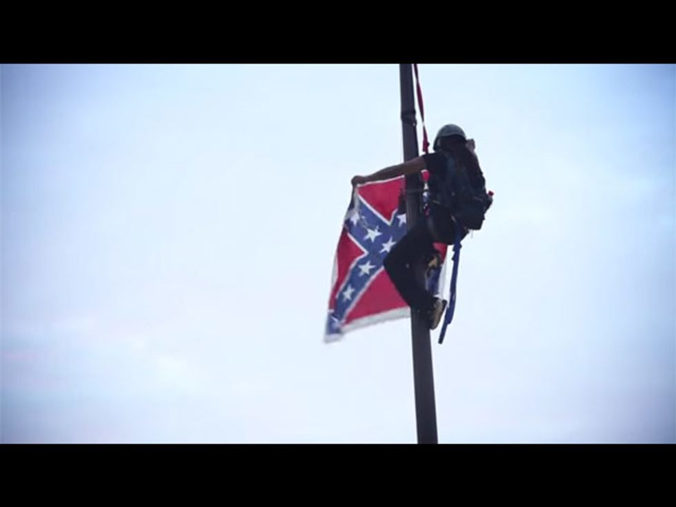 Reciting Prayers, Woman Takes Down Confederate Flag At South Carolina Capitol