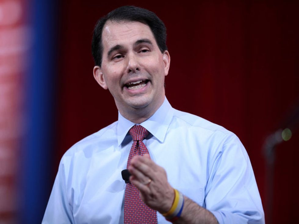 Scott Walker Gets Fooled By Activists With Giant ‘Check’ From Koch Brothers