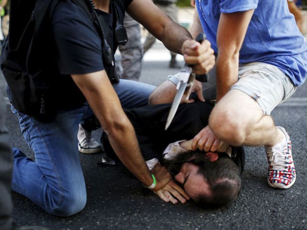 Religious Assailant Attacks Jerusalem Gay Pride March, Wounding Six