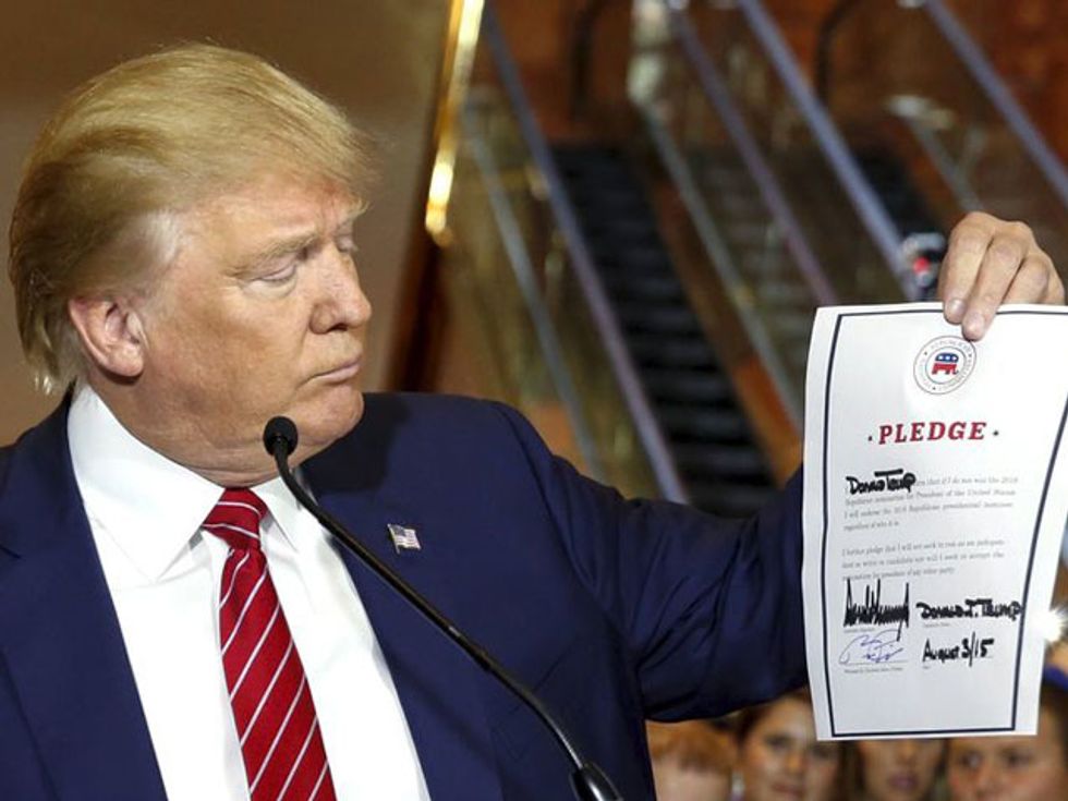 Front-Runner Trump Signs Republican Loyalty Pledge