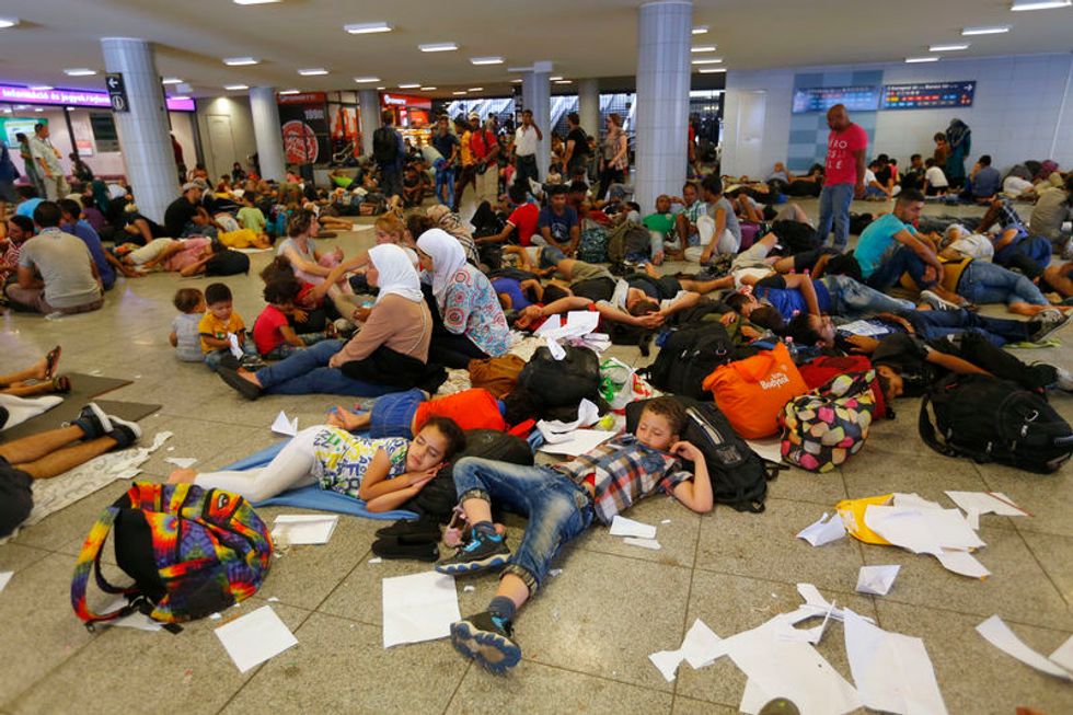 Migrant Chaos At Budapest Train Station; Germany Says EU Rules Still Hold