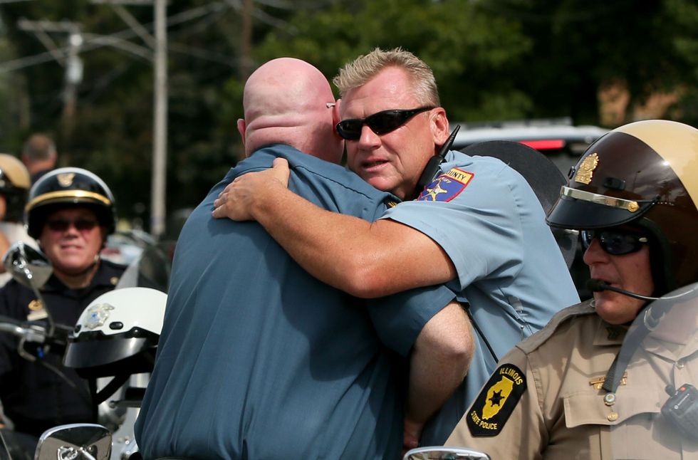 Thousands Mourn Slain Illinois Police Officer