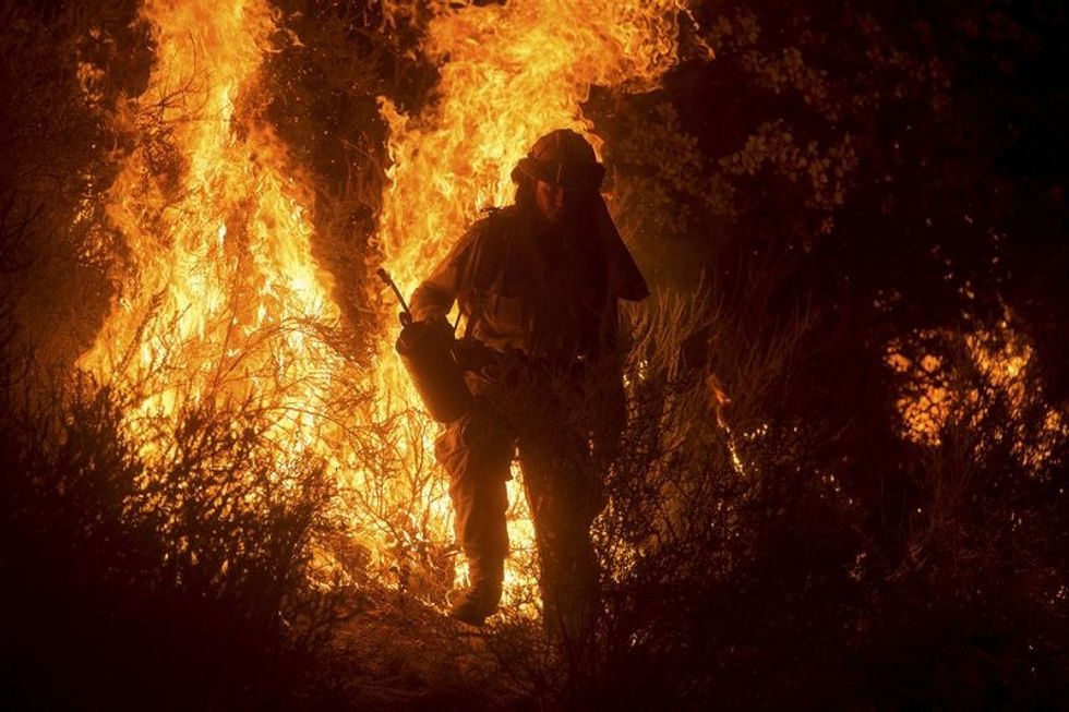 Thousands Evacuated As California Wildfires Sweep On