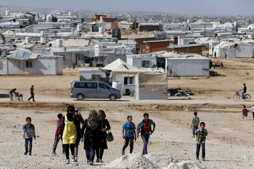 As Syrian Refugees Head To Texas, State Vows To Keep Them Out