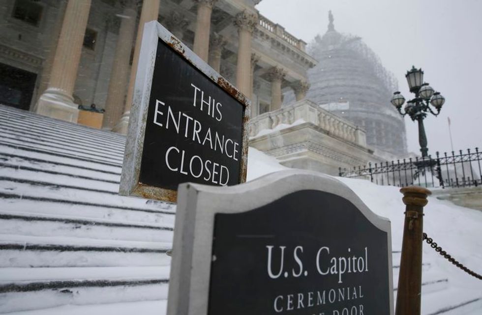 New York Rebounds After Blizzard, Washington Shuts Down Government
