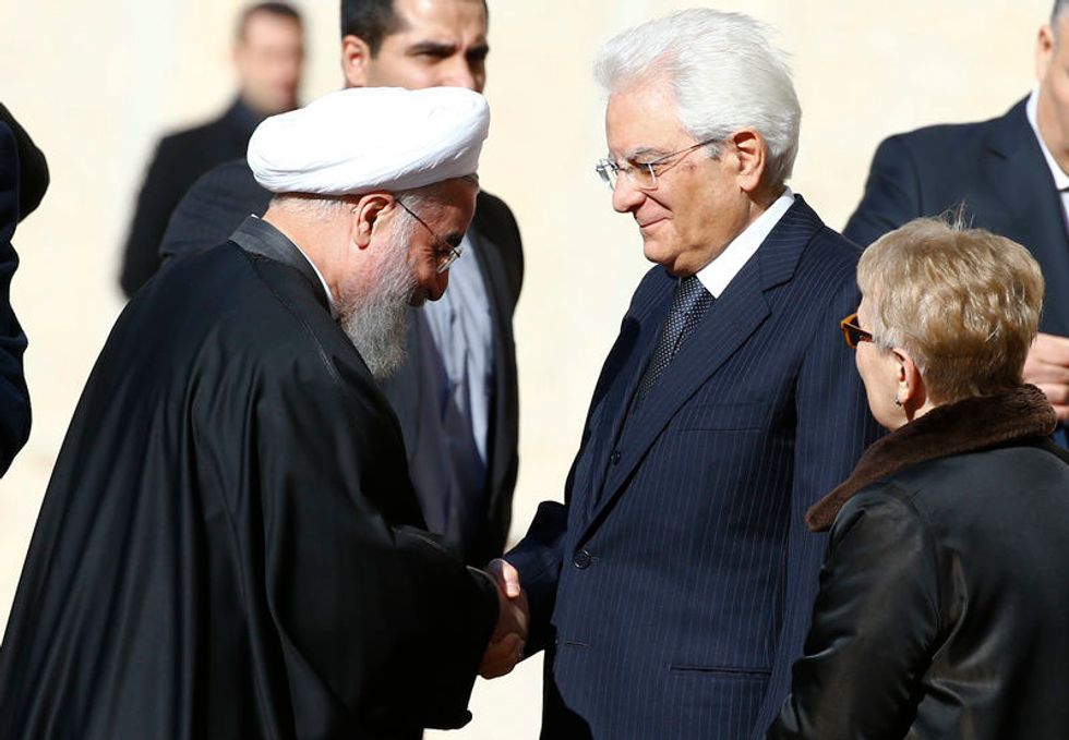 Deals And Warm Words Flow As Iranian President Visits Europe