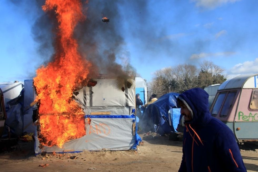 Clashes Break Out As France Begins Clearing Calais Migrant Camp