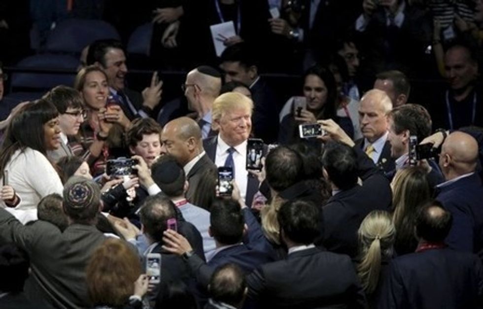 On Top Of The Tiger, Trump Smells Victory