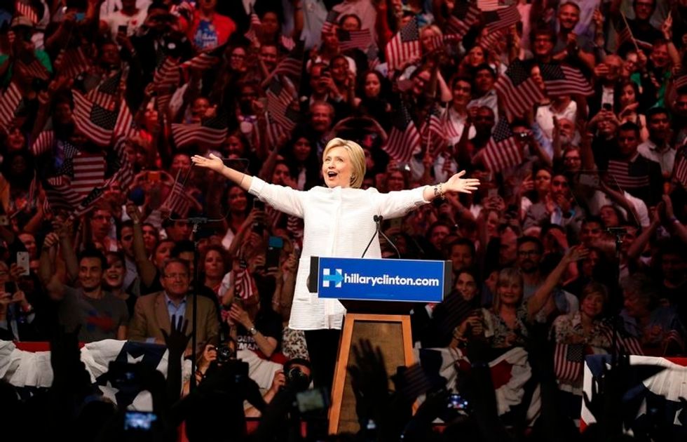 Hailing A First, Clinton Claims Democratic Nomination