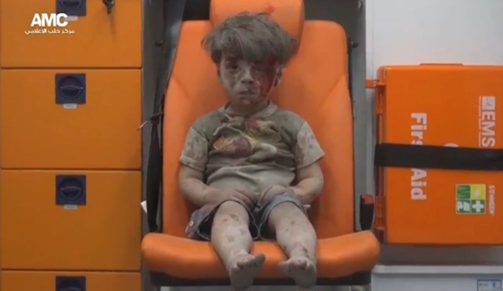 Syrian Boy Bewildered And Bloody After Aleppo Airstrike Goes Viral