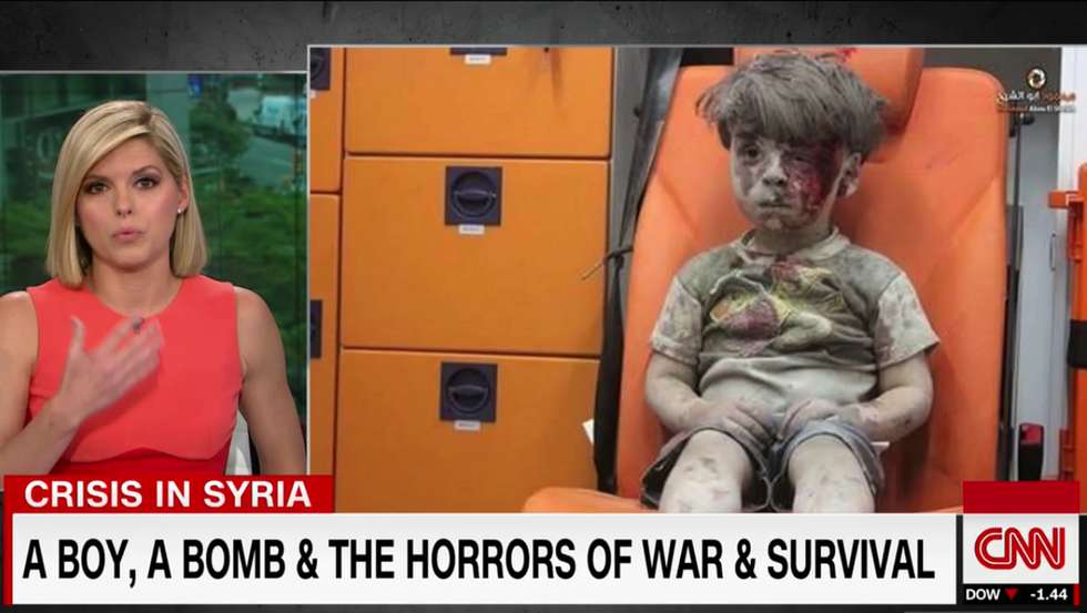 WATCH: CNN Anchor Moved To Tears Over Story of Syrian Boy