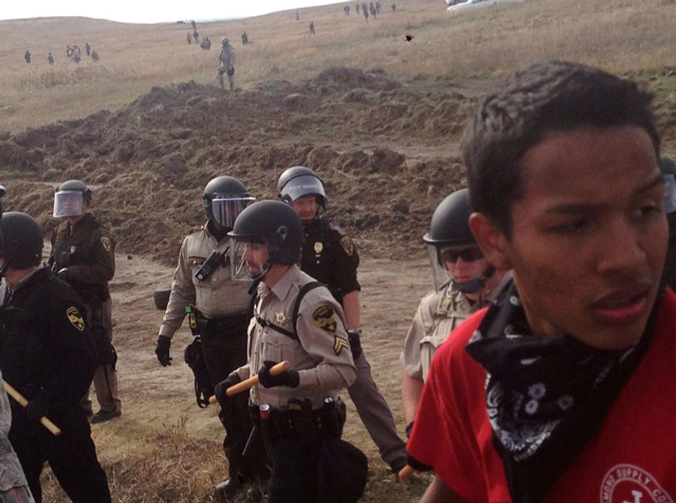 Militarized Police Are Collaborating With Oil Companies At Standing Rock